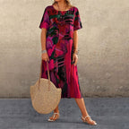 Nyelisse - Flowing dress in bright tropical colors