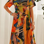 Nyelisse - Flowing dress in bright tropical colors